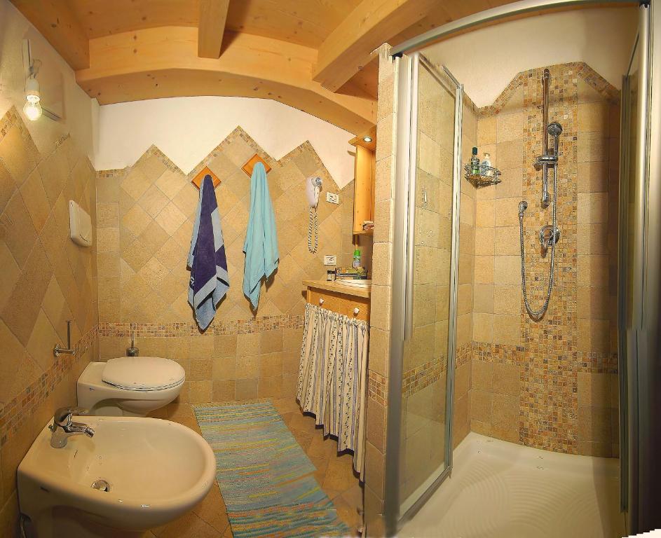 Aparthotel Camping Catinaccio Rosengarten à Pozza di Fassa Chambre photo